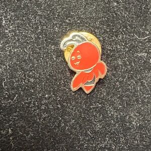 Red and Gold Cartoon Character Pin